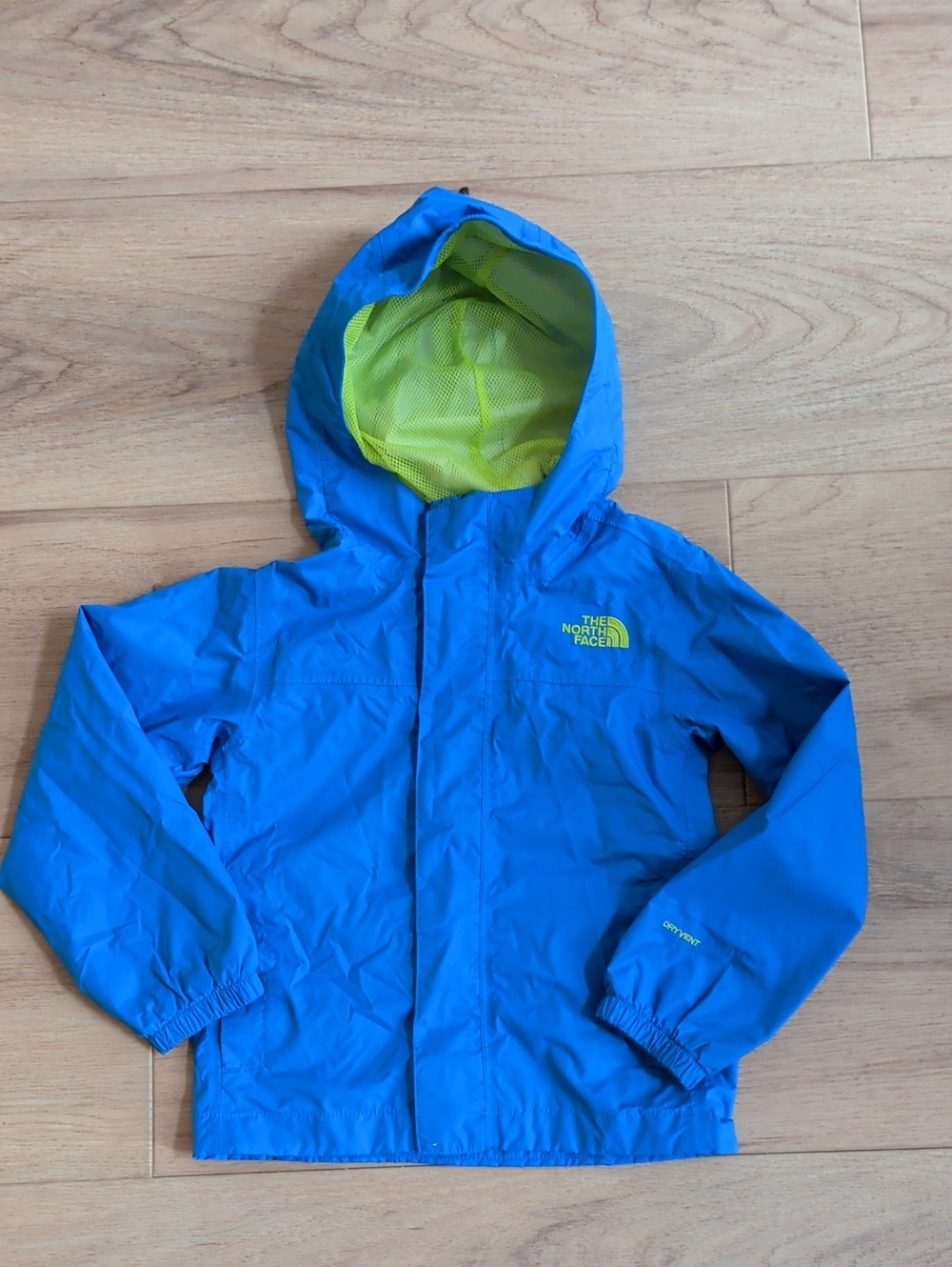 The North Face Kids Blue Rain Jacket with Lime Hood Lining